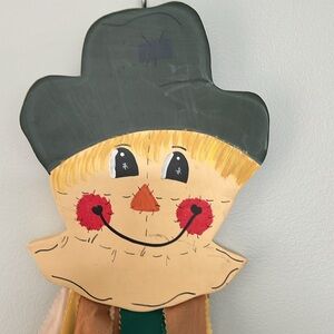 Scarecrow hanging decor - total hang length 32”. Scarecrow face 10”